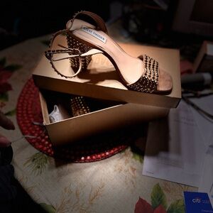 Bronze strappy heels. Only worn one time!